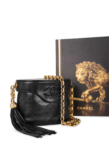 Chanel Quilted Leather CC Logo Tassel Mini Bucket Bag Navy Blue