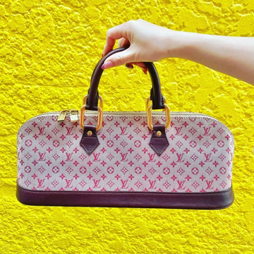 LOUIS VUITTON Vintage red Alma Long Handbag